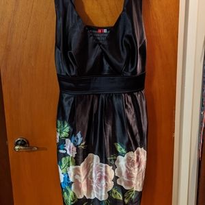 Black satin dress with flower print skirt